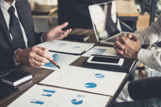 Co working conference, Business team meeting present, investor colleagues discussing new plan financial graph data on office table with laptop and digital tablet, Finance, accounting, investment.